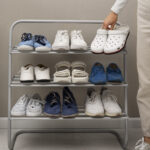 Calcados Empilhados Em Estantes De Sapatos Em Ambientes Fechados 150x150